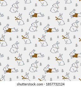 Christmas seamless pattern with cute hares. Vector illustration for wrapping paper and scrapbooking