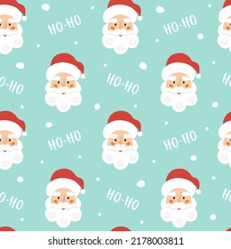 Christmas seamless pattern with cute Santa Claus head on blue background. Christmas kids vector illustration. Winter wallpaper. 