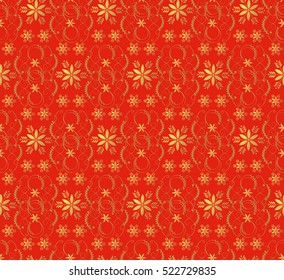Christmas seamless pattern with decorative gold snowflakes on red background.