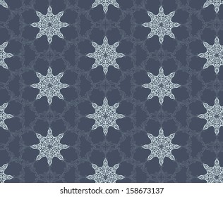 Christmas seamless pattern. Decorative napkin with detailed snowflakes in dark background.