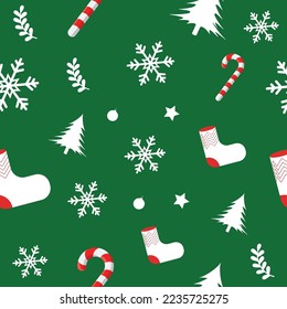 Christmas seamless pattern design with candy cane, snow flake, tree, leave, Santa Shoes, stars, balls with green background