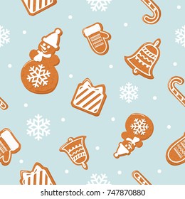 Christmas seamless pattern. Different Gingerbread cookies on pastel blue.