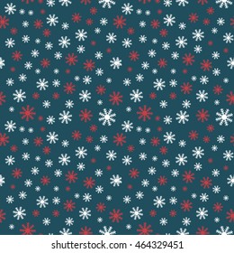 Christmas seamless pattern with different sizes snowflakes. Traditional winter signs background. Vector illustration for cards, posters, fabric print and other design.