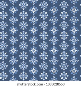 Christmas seamless pattern with embroidery snowflakes  on a dark background. The Nordic style. Folk print with flakes. Scandinavian, Ethnic motif.  