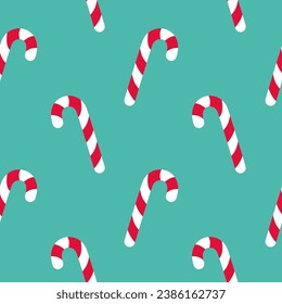 Christmas seamless pattern for fabric, paper. Stick candy on green background
