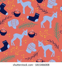 Christmas seamless pattern with a fawn, with mittens, with socks, with cups and spruce branches on a red background. Composition for textiles and paper.