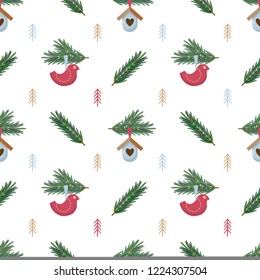 Christmas seamless pattern with fir branches, little birds and nesting boxes