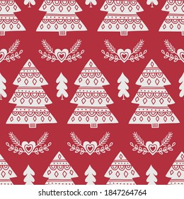 Navidad sin fierros con abetos, hojas, corazones, ramas de abetos sobre fondo rojo. Estilo escandinavo. Ideal para invitaciones de vacaciones, tarjetas de felicitación de invierno, papel pintado y papel de regalo 