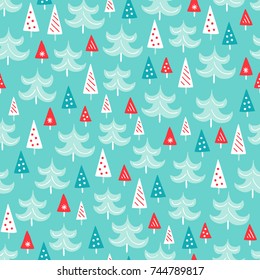 Christmas seamless pattern with fir trees on blue background. Perfect for wallpaper and holiday decorations 