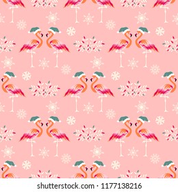 Christmas seamless pattern with flamingos in hats
