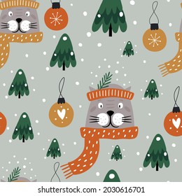 Christmas seamless pattern with funny cats. Winter vector background. New Year's design for wrapping paper, fabric, covers and cards. 