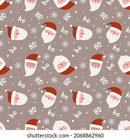 Christmas seamless pattern with funny santas. Vector illustration.