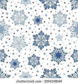 Christmas seamless pattern with geometric motifs. Snowflakes with different ornaments.