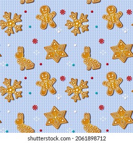 Navidad sin fisuras con galletas de pan de jengibre sobre fondo de punto azul. Navidad galletas caseras en forma de conejo y pan de jengibre, copo de nieve y estrella. Ilustración del vector