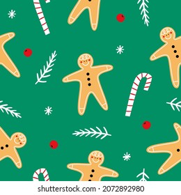 Christmas seamless pattern with gingerbread man and candy cane. Vector illustration