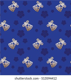 Christmas seamless pattern. Golden bells and snowflakes on a blue background

