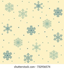 Christmas seamless pattern with green snowflakes on yellow background