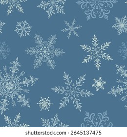 Navidades sin patrón con Grandes copos de nieve intrincados en varios diseños, blanco sobre fondo azul claro.