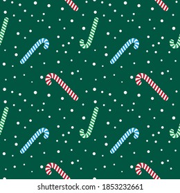 Christmas seamless pattern of lollipops, candy and snowflakes