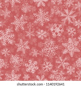 Christmas seamless pattern of many layers of snowflakes of different shapes, sizes and transparency. White on light red background
