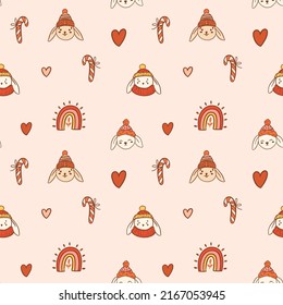 Christmas seamless pattern on pink background. Cute rabbits and boho elements. Merry Christmas and Happy New Year - Year of the Rabbit 2023.