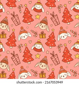 Christmas seamless pattern on pink background. Cute rabbits and boho elements. Merry Christmas and Happy New Year - Year of the Rabbit 2023.