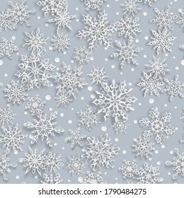 Patrón ininterrumpido de Navidad de copos de nieve de papel con sombras suaves sobre fondo azul claro
