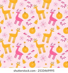 Christmas seamless pattern with pink and gold reindeer and Christmas balls. Festive winter pattern in flat style with snow for wrapping paper.