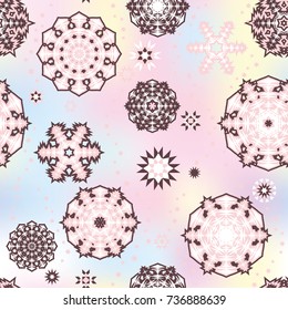 Christmas seamless pattern with random scatter falling snowflakes on a cloudy background.