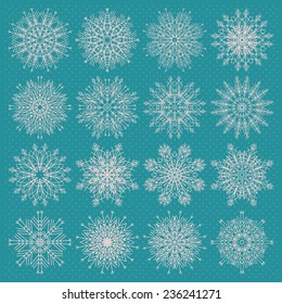Christmas seamless pattern from red and blue snowflakes on a pastel background. Snowflake winter set.  Vector illustration Blue backdrop.