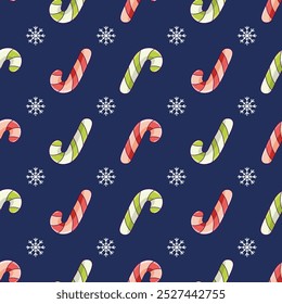 Christmas seamless pattern with red and green candy cane cane on dark blue background with snowflakes