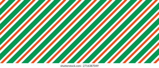 Christmas seamless pattern. Red and green diagonal stripes background. Candy cane repeating decoration wallpaper. Winter holiday lines backdrop. Xmas peppermint present wrapping print design. Vector