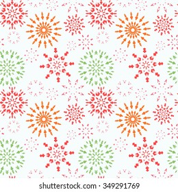 Christmas seamless pattern. Red, green, orange snowflakes on white background. Winter theme retro texture. Fruit snow. Vector illustration.