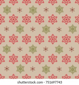 Christmas seamless pattern with red and green snowflakes.