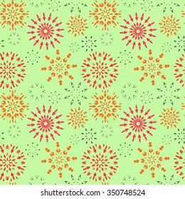 Christmas seamless pattern. Red, orange, gray snowflakes on light green background. Winter theme retro texture. Fruit snow. Vector illustration.