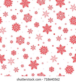 Christmas seamless pattern with red snowflakes on white background. Winter New Year pattern.