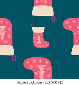 Christmas seamless pattern with red christmas socks with hand drawn christmas tree.