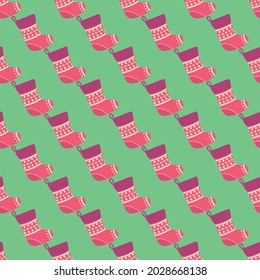 Christmas seamless pattern with red Christmas socks with snowflakes, specks