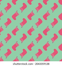 Christmas seamless pattern with red Christmas socks with snowflakes, specks, pattern