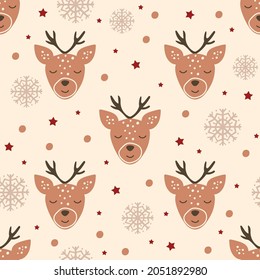 Christmas seamless pattern with reindeers and snowflakes. Vector illustration.