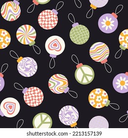 Christmas seamless pattern with retro groovy balls on a black background. Holiday winter print. Vector  illustration.