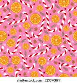 Christmas seamless pattern with rings of an orange, candy, anise, berries of cranberries, snowflakes and fir branches.