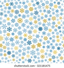 Christmas seamless pattern of small snowflakes, blue and brown on white