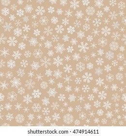 Christmas seamless pattern of small snowflakes, white on light brown