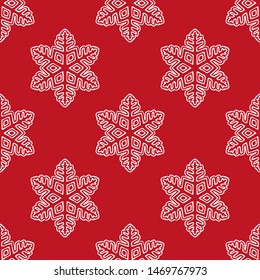 Christmas seamless pattern with snowflakes and 2020 text on red background. Vector texture for wrapping paper, fabric, banners