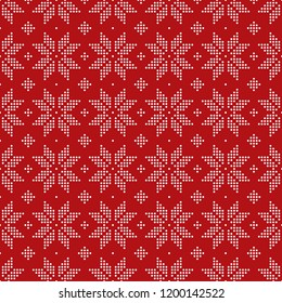Christmas seamless pattern of snowflakes big classic knitted pattern of small circles of white dots on a bright red background.