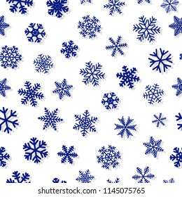 Christmas seamless pattern of snowflakes, blue on white background
