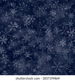Patrón ininterrumpido de Navidad de copos de nieve de diferentes formas, tamaños y transparencia, sobre fondo azul oscuro