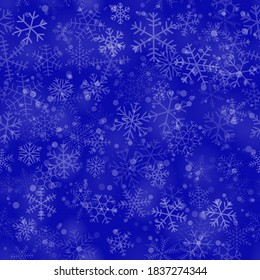 Patrón ininterrumpido de Navidad de copos de nieve de diferentes formas, tamaños y transparencia, sobre fondo azul