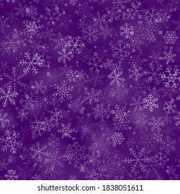 Christmas seamless pattern of snowflakes of different shapes, sizes and transparency, on purple background
